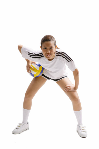 woman holding volleyball - Foto, Imagen