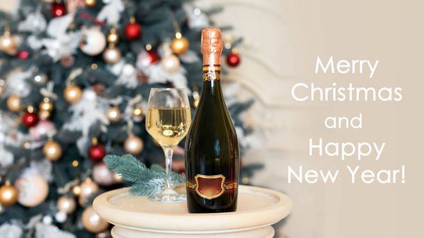 Happy New Year Card with white wine or champagne in Christmas setting. Winter holidays theme. - Photo, image