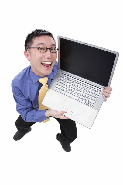 Businessman with open laptop - Valokuva, kuva