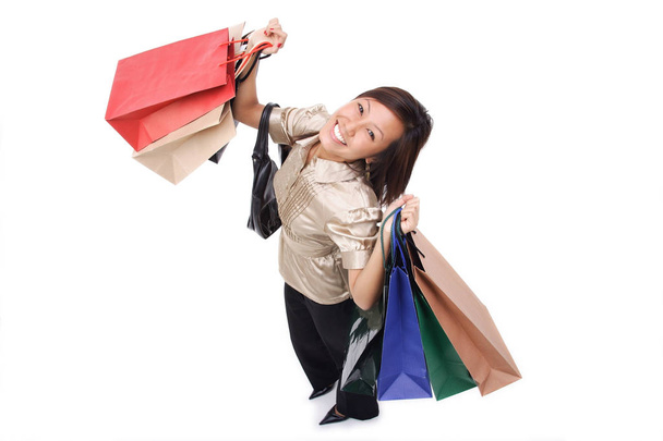 Woman carrying shopping bags - Foto, Imagen