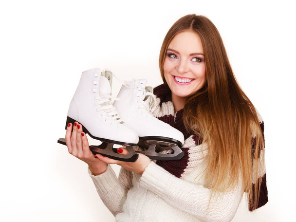 Woman with ice skates getting ready for ice skating - Foto, Imagen