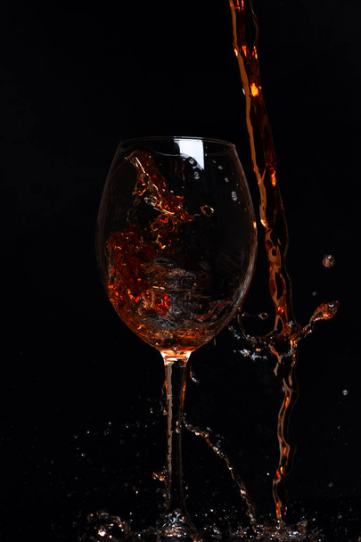 glass with red wine drops - Φωτογραφία, εικόνα