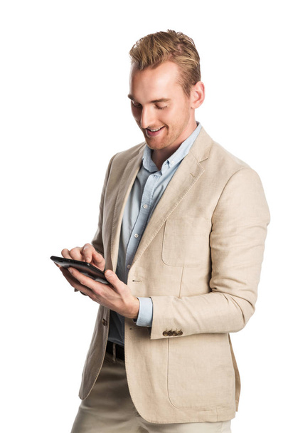 Smiling man with digital reader - Foto, Bild