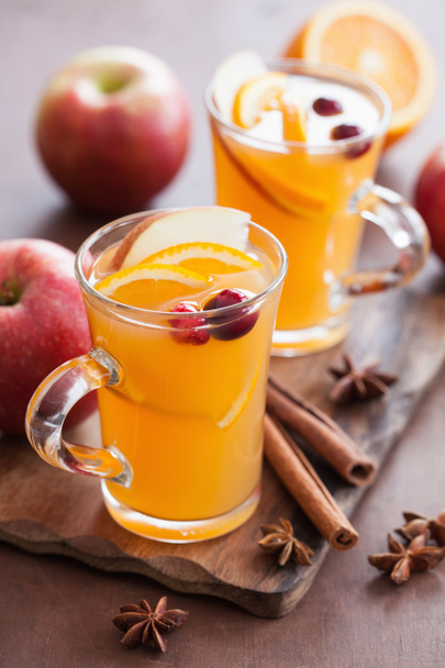 hot apple orange cider with cinnamon spice warming drink - Фото, изображение