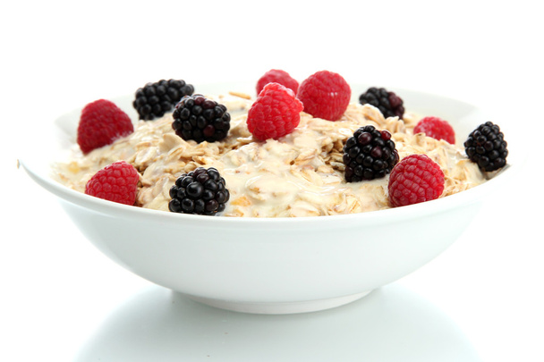 tasty oatmeal with berries, isolated on white - Fotó, kép
