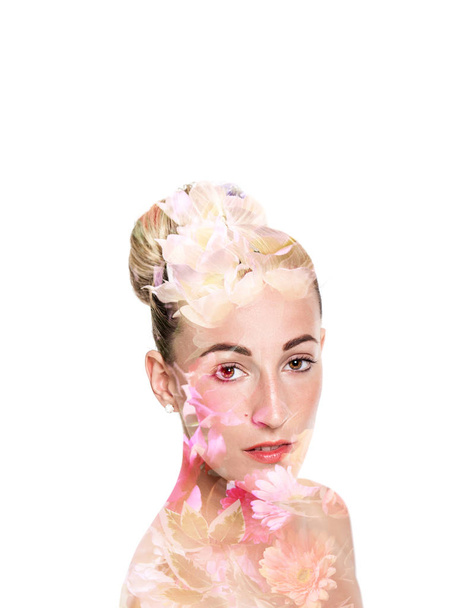 Double exposure of woman with hair bun and colorful flowers - Fotografie, Obrázek