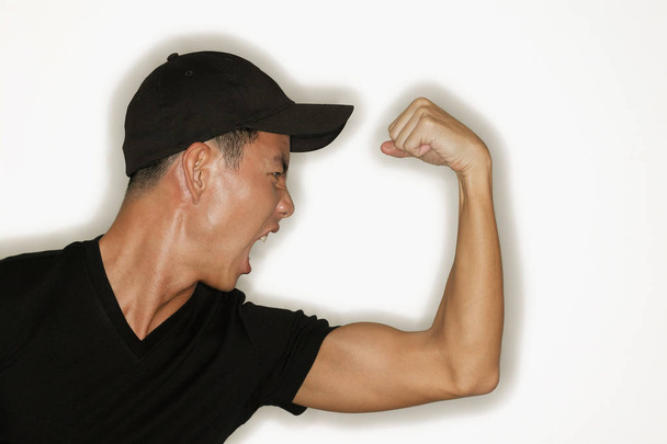 man flexing muscles - Fotó, kép