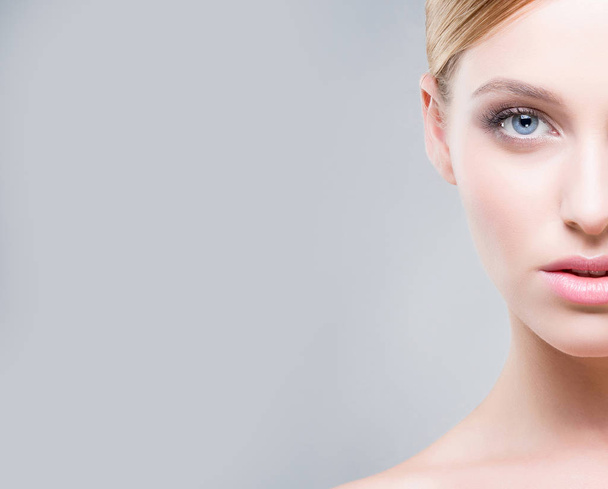Portrait of young blonde woman with light makeup - Photo, Image