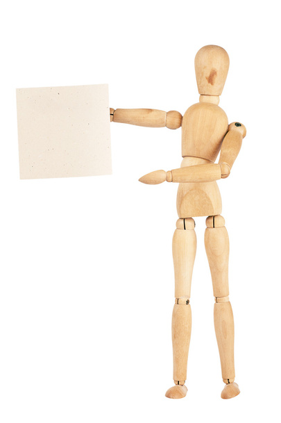 Wooden dummy holding paper - Zdjęcie, obraz