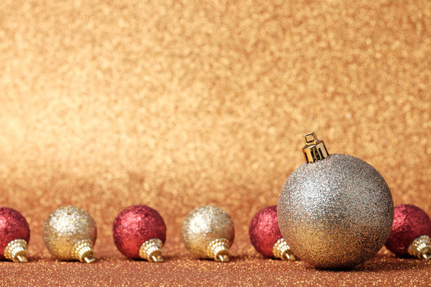 Christmas and New Year decorations on glitter background - Фото, изображение