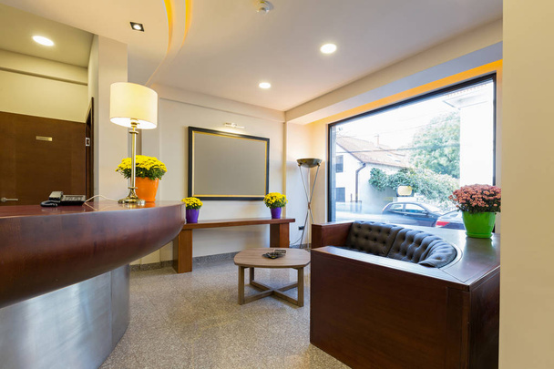 Reception area with reception desk in modern hotel - Photo, Image