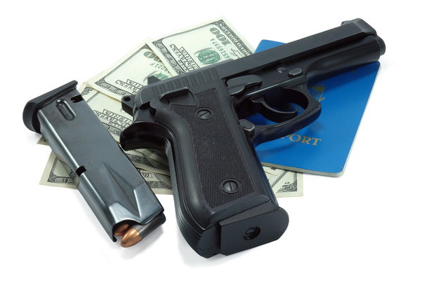 Black gun, passport, bullets and cash - Photo, Image