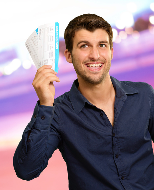 A Young Man Holding Boarding Pass - Photo, Image