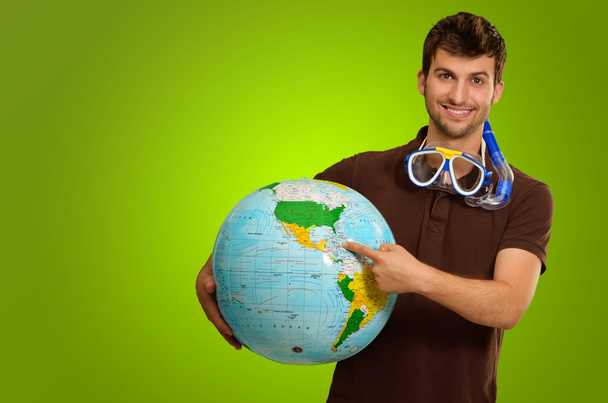 Young Man With Globe And Snorkel - Foto, Imagen