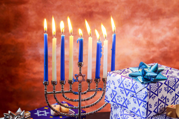 jewish holiday Hanukkah with menorah over wooden table - Photo, Image