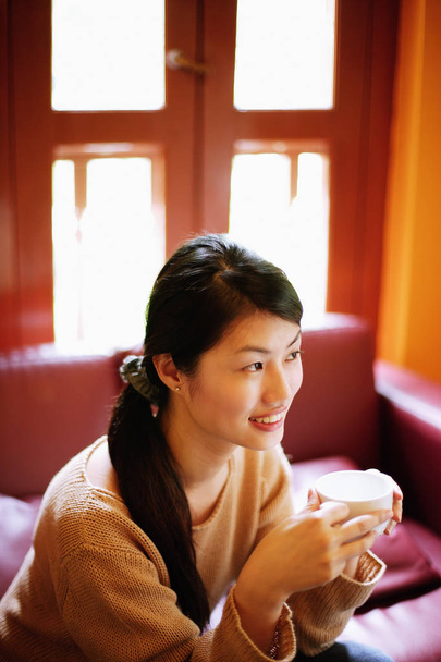 Woman with coffee cup - Photo, Image