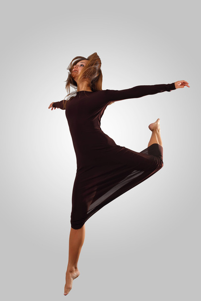 Young female dancer jumping - Photo, Image