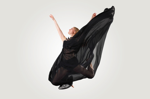 Young female dancer jumping - Фото, зображення