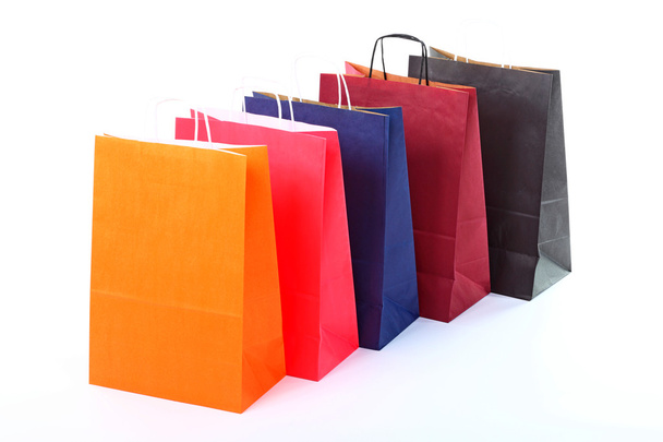 Shopping brown gift bags background - Фото, изображение