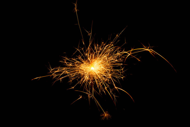 Christmas sparkler on black background - Valokuva, kuva