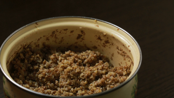 buckwheat porridge with butter - Кадры, видео