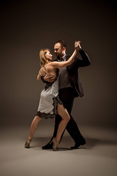 The man and the woman dancing argentinian tango - Фото, зображення