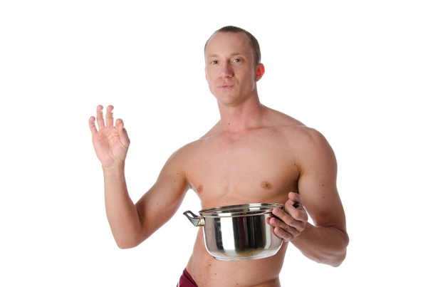 Sexy shirtless cook and pan. - Foto, afbeelding