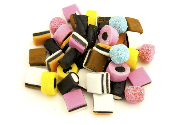 Лікерні цукерки проти білого
 - Фото, зображення