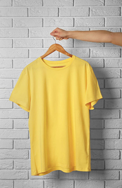 Blank yellow t-shirt - 写真・画像