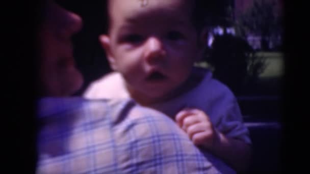 Woman holding toddler baby on hands - Video, Çekim