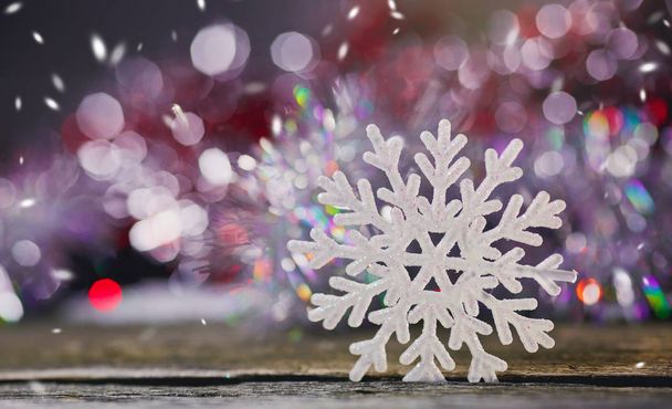 snowflakes on a wooden background. - Valokuva, kuva