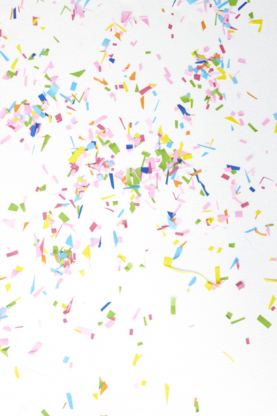 colourful sparlking confetti on white background - Photo, Image