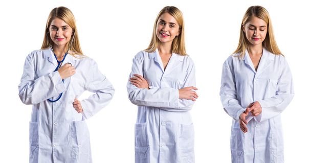 Doctor woman smiling with her arms crossed - Photo, Image