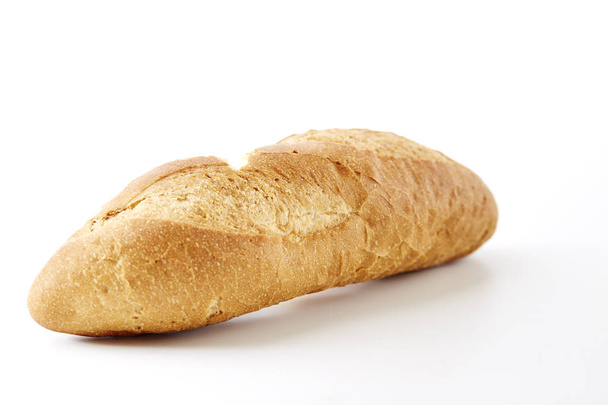 традиційний французький хліб на білому тлі
 - Фото, зображення