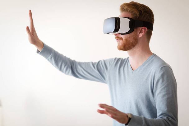 Man wearing future technology VR glasses - Foto, Bild