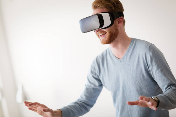 Man wearing future technology VR glasses - Fotoğraf, Görsel
