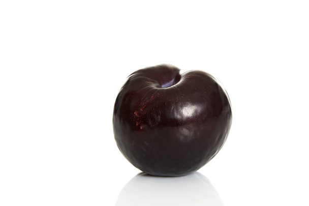two black plums, isolated on white background - Фото, изображение