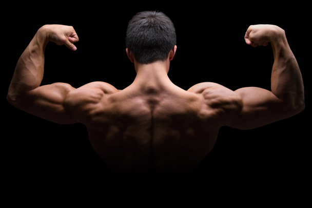 Bodybuilder bodybuilding κάμψη θέτοντας stro πίσω δικέφαλους μυς - Φωτογραφία, εικόνα