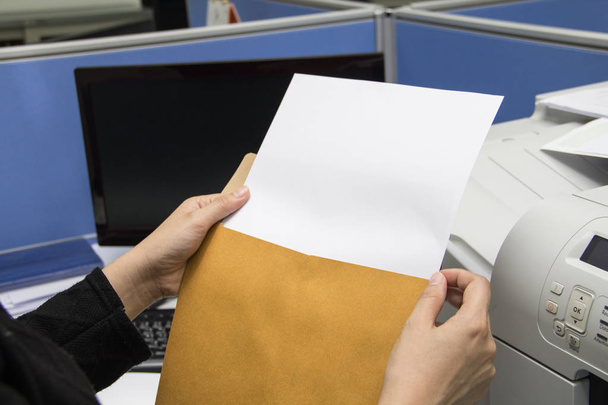 Hand holding envelope on office background - Photo, Image
