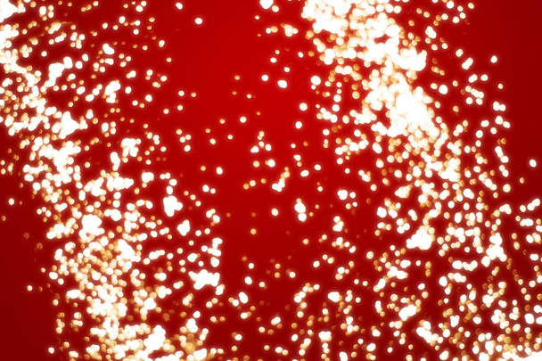 Χρυσή σωματίδια ή bokeh σε κόκκινο φόντο. Χαρούμενα Χριστούγεννα πρότυπο - Φωτογραφία, εικόνα
