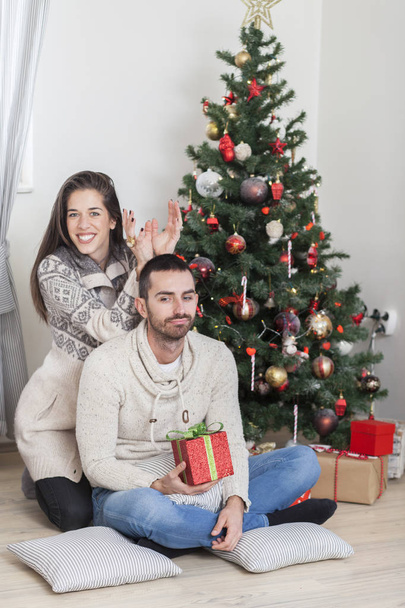 couple having fun on Christmas at home - Valokuva, kuva