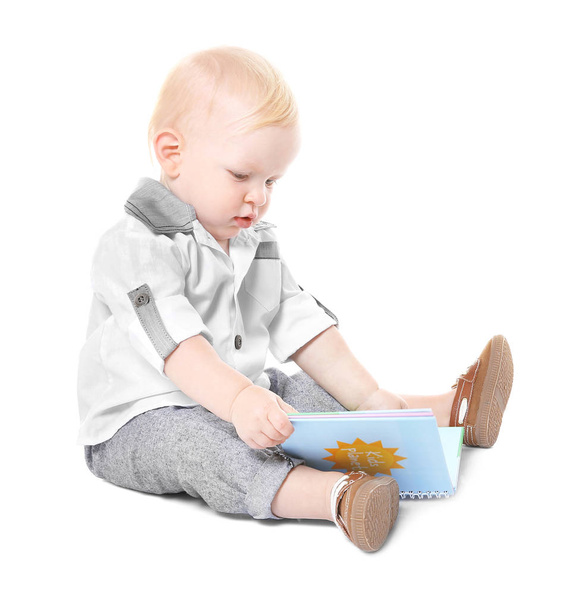 Baby boy with book - Zdjęcie, obraz