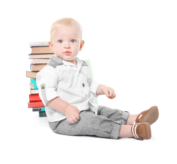 Baby boy with books - Фото, изображение