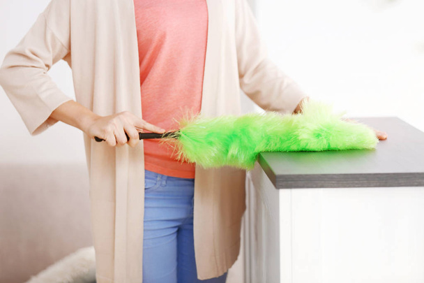 woman cleaning house from dust - Photo, image