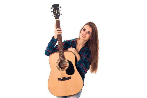 young charming brunette girl with guitar - Фото, зображення