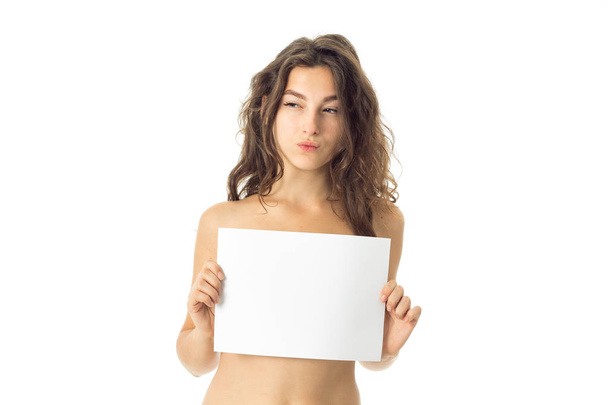 nude brunette girl with placard - Foto, Imagen