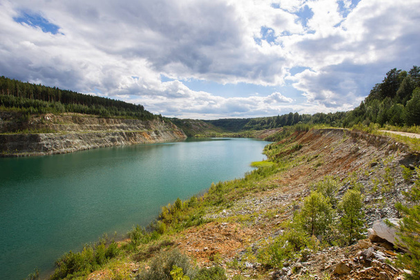 Flooded quarry mine pit blue water - Foto, immagini