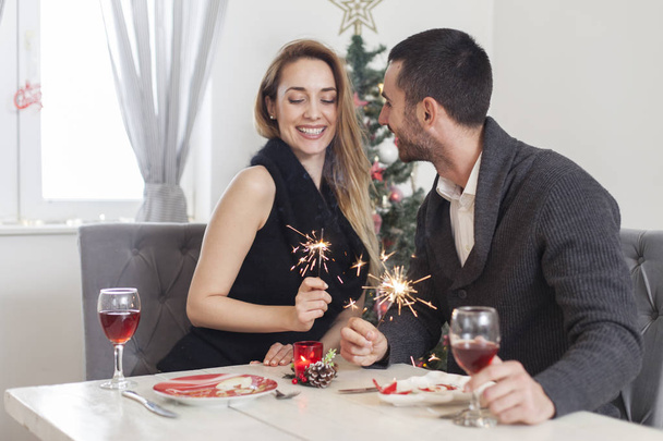 happy couple having a Christmas dinner  - Photo, image