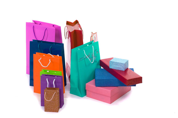 Emballages et boîtes à provisions multicolores et lumineuses isolés sur
 - Photo, image