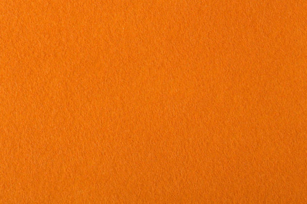 Texture of orange  felt. - Foto, afbeelding